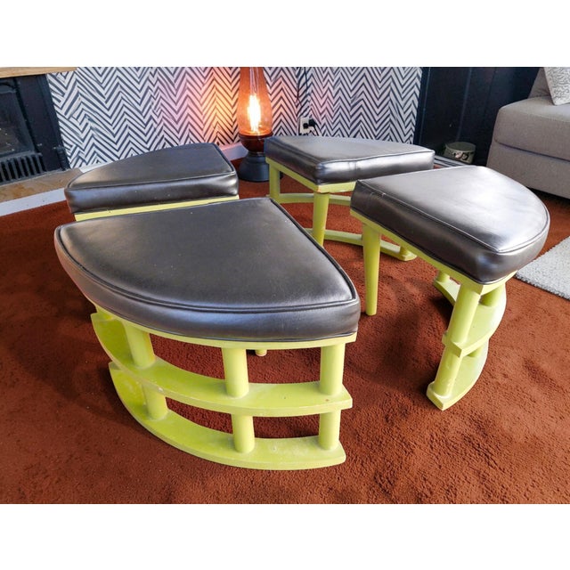 Painted wood with cushioned black vinyl seats. Note veneer loss under one section. Unseen and does not affect use or the...