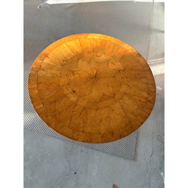 Early 19th century Swedish Biedermeier / Gustavian center table featuring an exceptional radiating starburst parquetry...