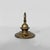 Italian mid-century modern brass doorstops, 1950s Pair of turned brass doorstops, featuring a flared circular base and a...