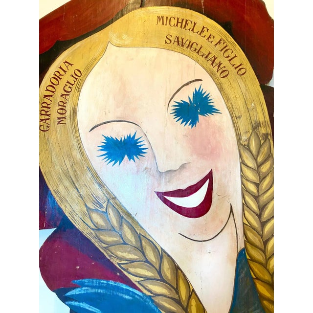 Large advertising sign 60s, painted on wood.