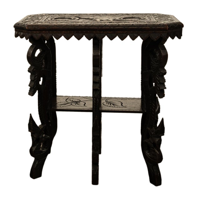A good antique late 19th century Anglo-Indian carved teak lamp or side table, circa 1900. The table is very finely carved...