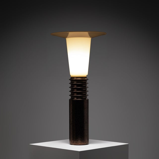Designed by Uno and Östen Kristiansson for Luxus, Sweden, this table lamp exemplifies the innovative spirit that defined...