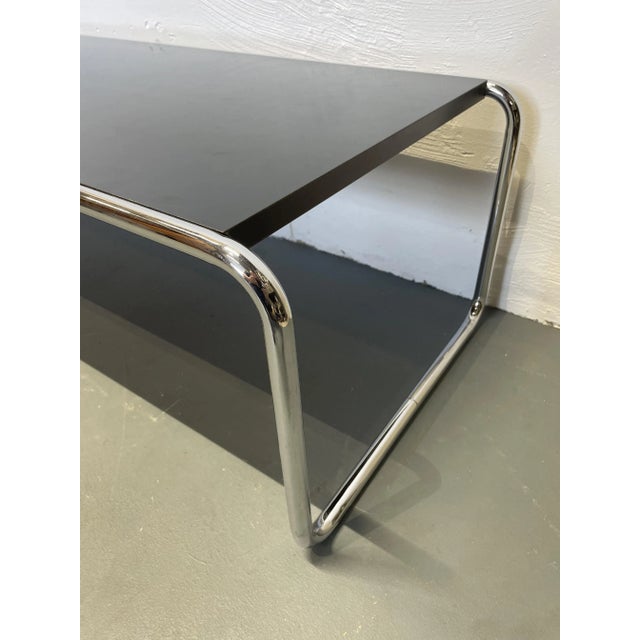 Coffee table designed by Marcel Breuer for Gavina in Italy in the 1960s. Age-related signs of wear such as scratches,...