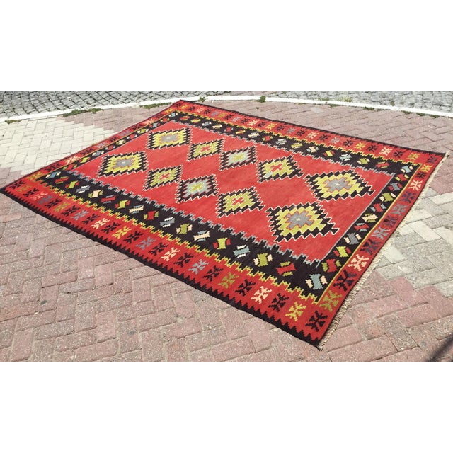 This beautiful, vintage, handwoven kilim is approximately 60 years old. It is handmade of very fine quality, hand-spun...