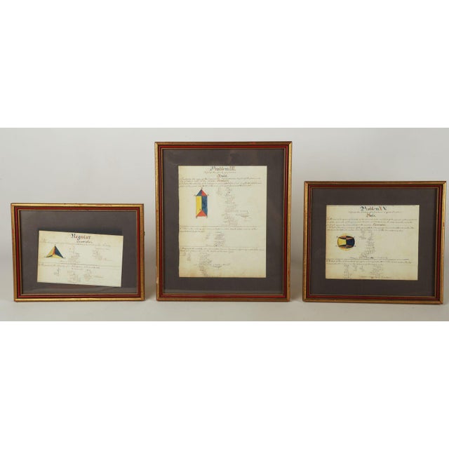(9) Framed and Illuminated Geometry Equations in ink and watercolor to include a double sheet of ink and watercolor...