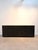 Bring understated luxury into your home with this beautifully crafted contemporary sideboard. Finished in a rich dark...