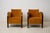 Pair of Swedish art deco armchairs. These vintage armchairs are made in Sweden around 1930 with classic rounded armrests...