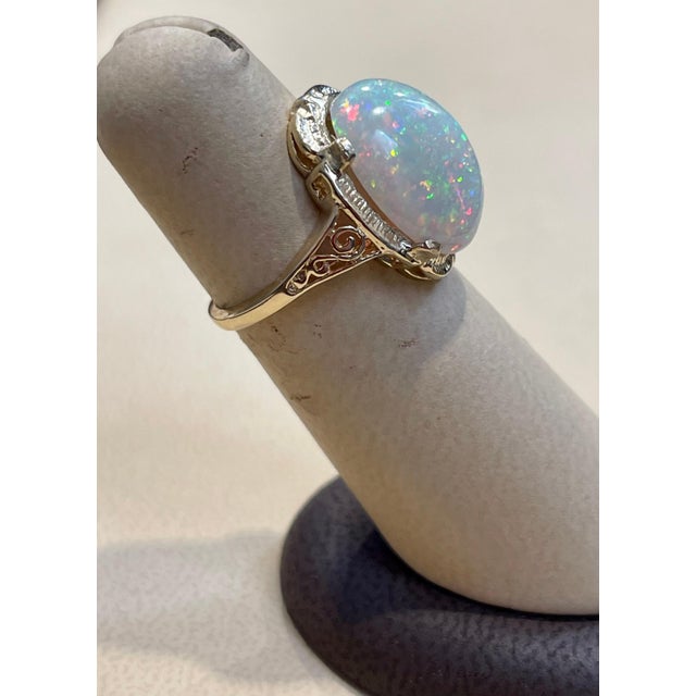 9 Carat Oval Shape Ethiopian Opal Cocktail Ring 14 Karat Yellow Gold For Sale - Image 10 of 18