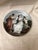 This elegant vintage porcelain plate features a beautifully hand – painted classical scene. Adorned with graceful figures...