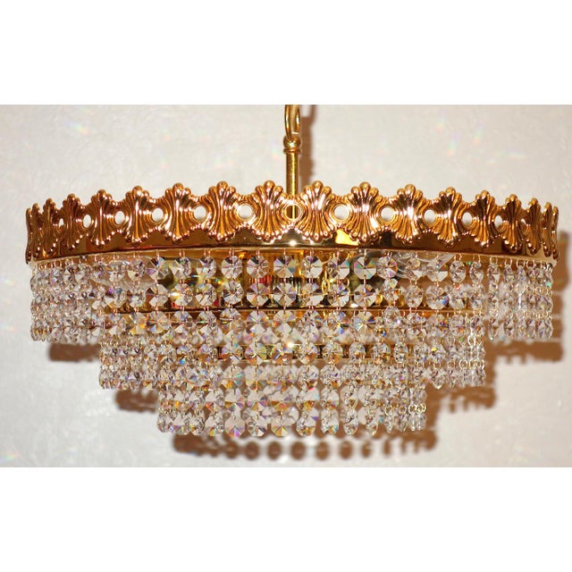Vintage Brass, Lead Crystal, and 24k Gold-Plated Chandelier from Sölken Leuchten, 1970s, in Very Good conditions. Designed...