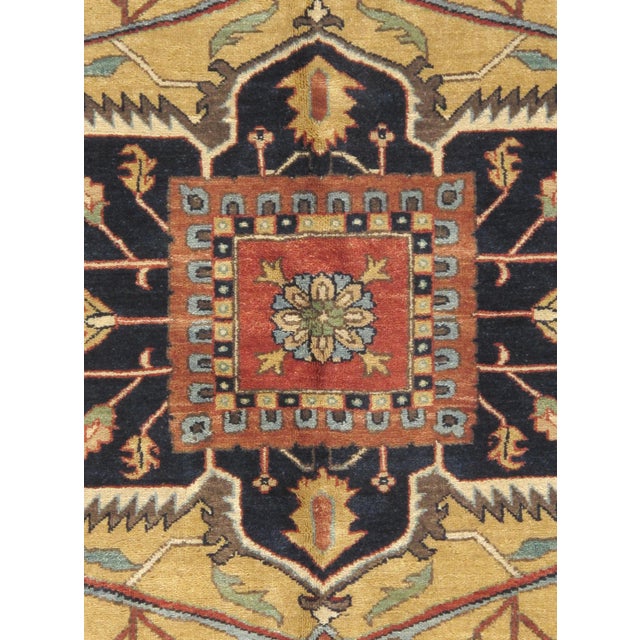 The Serapi Collection reinterprets traditional tribal geometric design through a refined palette. Each rug is hand-knotted...