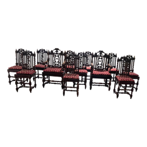 Early 20th Century Set of 12 Black Forest Style Highly Carved Dining Chairs