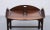 Very nice classic tray table. Tick solid mahogany tray. Fits perfect on the table. Brass hinges. Good quality table....