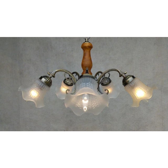 Material: metal, wood, glass. Nice authentic Retro Vintage Chandelier, bronze holder with wooden accessories, 5 light...