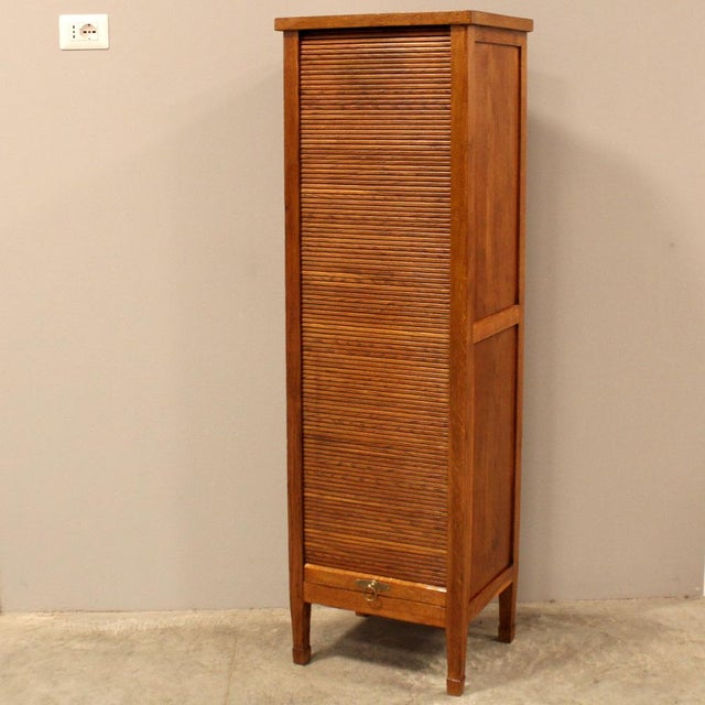 Single-shutter filing cabinet Made of oak Early 1900s Dimensions: width 47 cm, depth 38 cm, height 151 cm Restored (see...