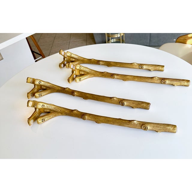 Rare opportunity to purchase 4 P.E. Guerin faux bois tree branch gilt bronze coffee legs. You the flexibly of making your...