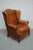 This cognac-colored leather club chair comes from the Netherlands. It is upholstered with cognac-colored leather and...