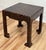 Sturdy petite wood table painted a rich brown then stenciled black for a floral pattern. Features unique almost Ming style...
