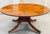 72" English Regency Revival Figured Elm Sunburst Center Pedestal Dining Table on Brass Casters For Sale - Image 14 of 16