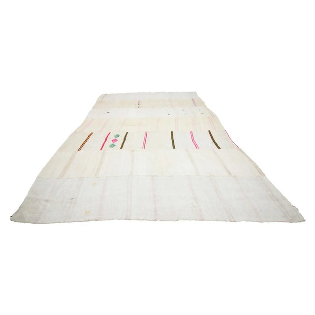 Handwoven vintage hemp kilim rug from Yozgat region of Turkey. Approximately 50-60 years old. In very good condition.