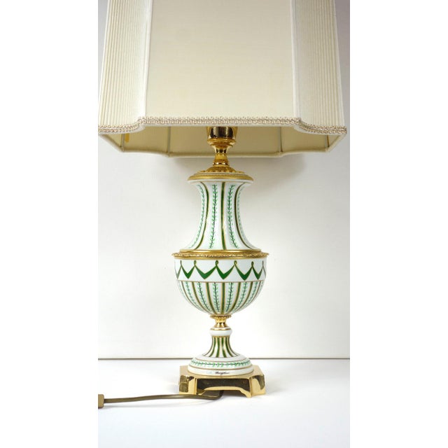 Vintage Porcelain and Brass Table Lamp by Giulia Mangani, 1950s, in Very Good conditions. Designed 1950 to 1959 This piece...