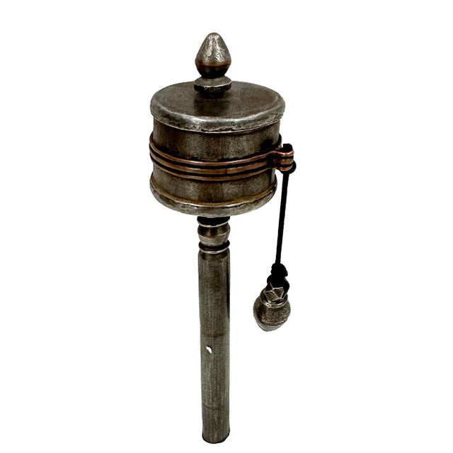 This is handcrafted Tibetan copper handheld spinning Prayer Wheel. It has detailed handcrafted Tibetan traditional design...