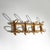 An elegant wall coat rack in rattan and woven wicker, embodying the light and natural aesthetic that defined 1960s design....
