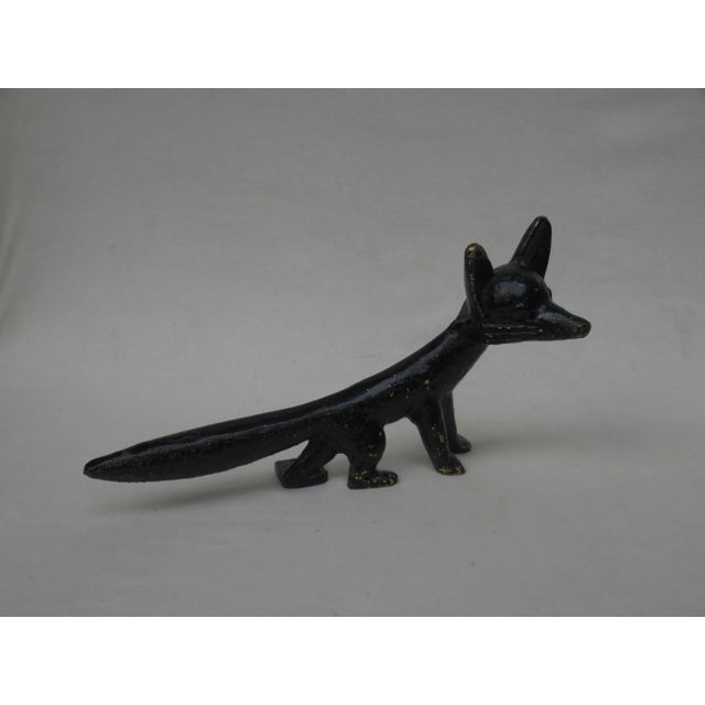 The fox as ''bootjack'' is made of cast brass, black lacquered and semi-plastic. The object can be fixed with two screws...