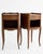 A pair of French oak bedside tables in the Louis XV manner, dating to 1910 and typical of the high-quality provincial...