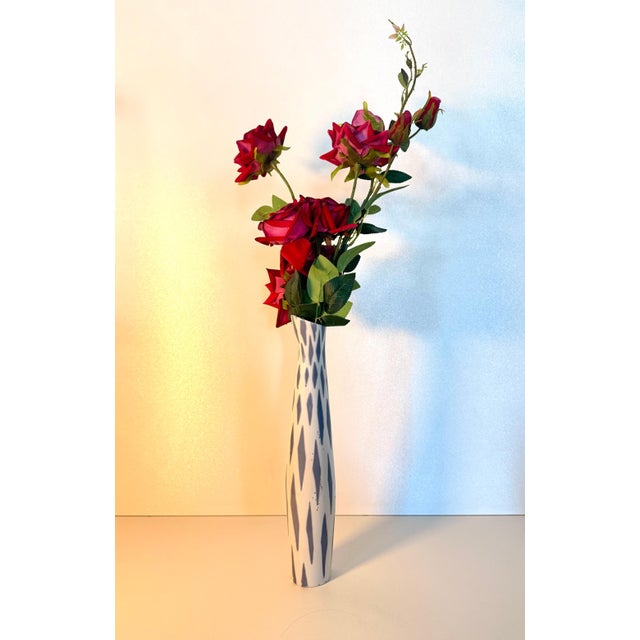 Made in Czech Republic by Jindřich Marek for Royal Dux, 1960s. It is made in white and blue hand-glazed porcelain. It is...