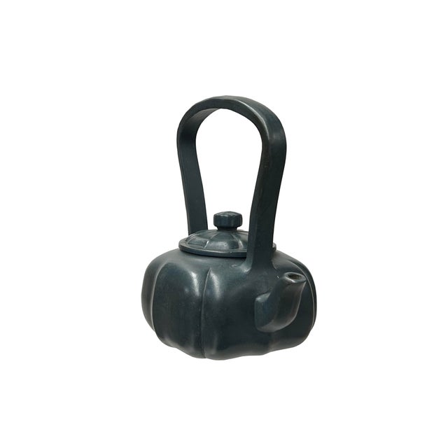 Elevate your tea ritual with this exquisite vintage handmade Zisha clay teapot, boasting a unique and charming persimmon...