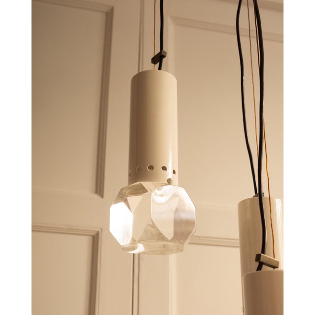 Italian Pendant Light, circa 1970s A striking Italian pendant light dating from the 1970s, composed of a sculptural...