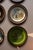 Elevate your space with this stunning, highly collectible curated gallery set of nine (9) vintage mid-century Swiss folk...