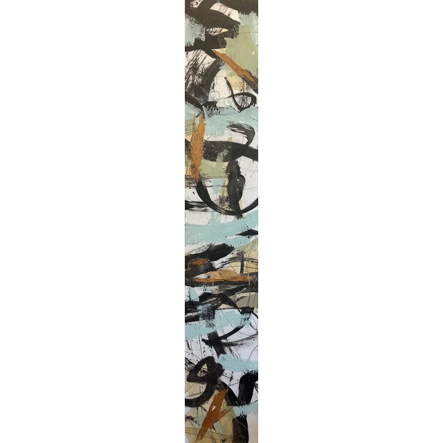 Black brushwork twists and loops across pale blue, cream and earthy olive tones, with small touches of ochre. The...