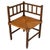 French Coin-de-Feu Bobbin-Turned Oak Corner Chair with Rush Seat, circa 1895 An engaging late-19th-century French corner...