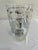 Charming clear glass cocktail shaker decorated with black and red cocktail illustrations, six classic drink recipes, and...