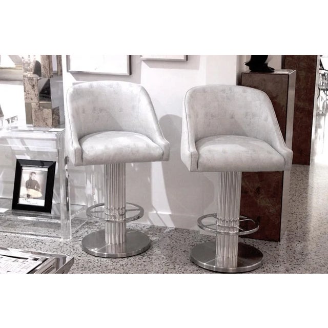 This pair of Design for Leisure Art Deco Machine-Age style memory swivel bar stools will make the perfect perch for you...