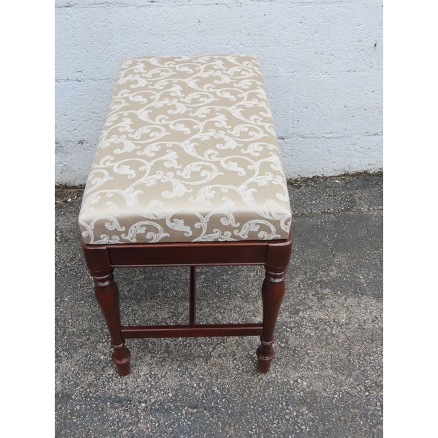 This charming Vanity Stool Ottoman is made of wood, solid wood, and upholstery. This lovely Stool has Traditional style;...