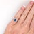 This gorgeous ring design showcases an oval cut Royal Blue Ceylon Sapphire with cascading baguette diamond accents all set...