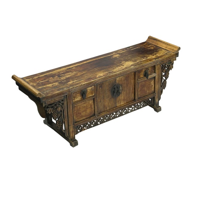 Embrace the timeless elegance of the Far East with this magnificent antique Chinese coffer or altar table. Crafted from...