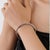 925 Sterling Silver Geometric Hinged Bangle With Mixed Cut Pink Sapphires - Caratandher For Sale - Image 9 of 15