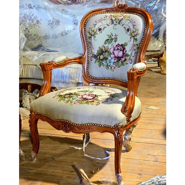 Elegant and timeless, this French Louis XV armchair brings classic European beauty into any refined interior. Upholstered...