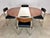 A rare dining set designed by Nanna Ditzel for Kolds Savvaerk, Denmark (unsigned) circa 1950’s/1960’s. Features a hidden...