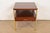 A sleek and stylish Mid-Century Modern two-tier single drawer nightstand or end table By Paul McCobb for Calvin Furniture,...