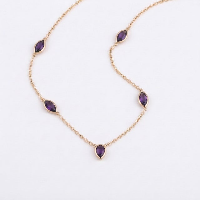 Adorn your neckline with the elegant, minimalist design. This piece blends modern aesthetic with timeless charm, making it...