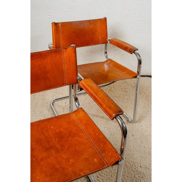 Mid-Century Modern Chairs in Cognac Brown Leather, 1970s, Set of 2, in Good conditions. Designed 1970 to 1979