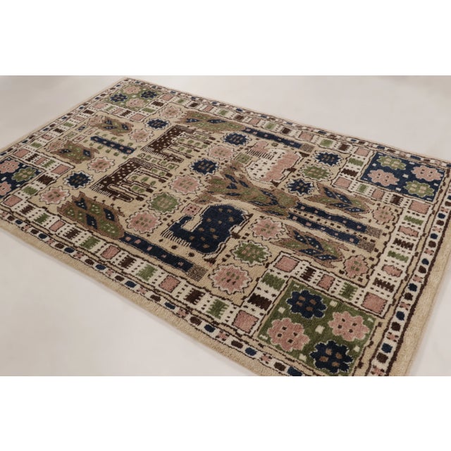 Hand-knotted in premium wool, this 5x8 rug is a vibrant and imaginative addition to Rug & Kilim’s Scandinavian collection....