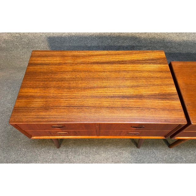 Here is a beautiful set of two scandinavian modern end tables - nightstands in teak wood manufactured in Denmark in the...