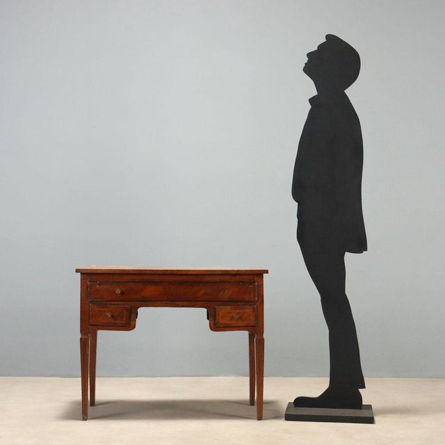 Neoclassical walnut writing desk from the 19th century, expertly transformed from a dressing table. This elegant piece...