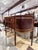 A finely crafted inlaid mahogany buffet that reflects classic craftsmanship with a refined silhouette and rich tonal...